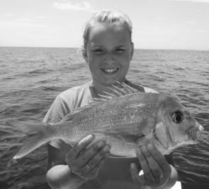Rebecca Finney with a plate-size red. Outside is producing some good snapper fishing and it’ll get better as it gets colder. 